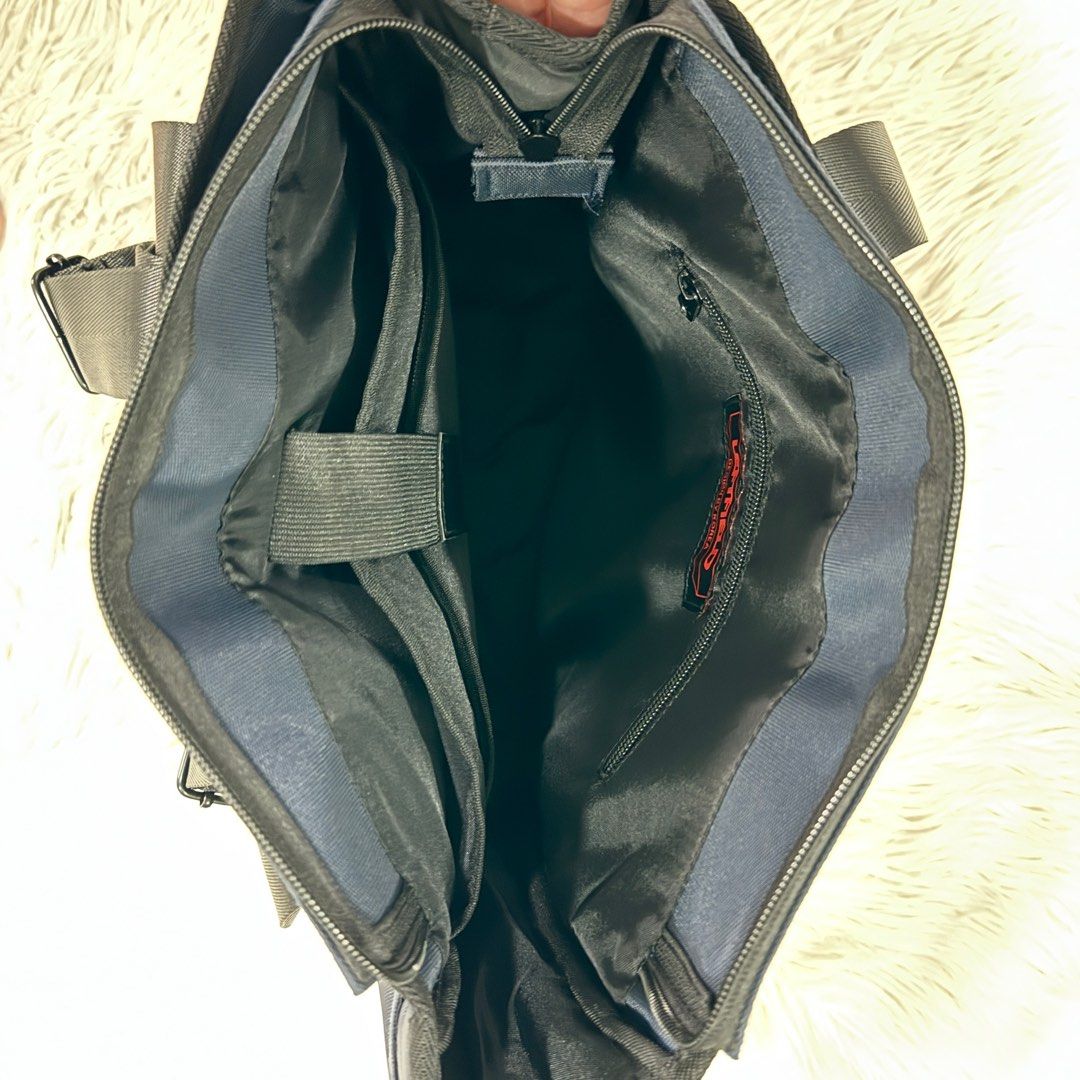Backpack (Category: Backpacks) located in Singapore. Submitted by k00lsheep (Listing ID 1344457188, Image 6). Description: Backpack Brand NEW Not used at all Versatile backpack with dual carrying options: • The backpack sling can be neatly tucked into the back compartment. (Picture 3) • Features multiple compartments, including a dedicated laptop section. (Picture 5) • Both sides come with dual slots for added storage. Dimensions: • Length: 39cm 