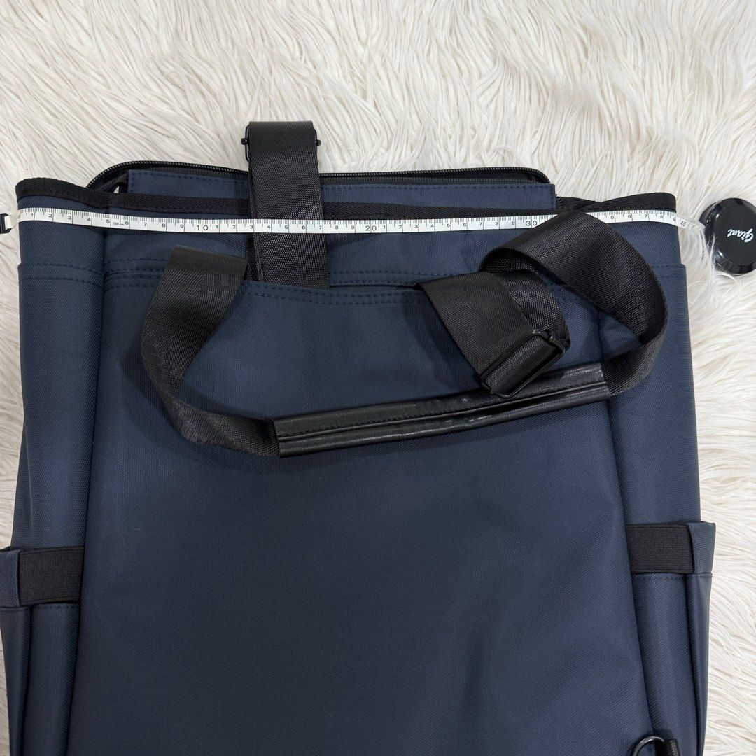 Backpack (Category: Backpacks) located in Singapore. Submitted by k00lsheep (Listing ID 1344457188, Image 7). Description: Backpack Brand NEW Not used at all Versatile backpack with dual carrying options: • The backpack sling can be neatly tucked into the back compartment. (Picture 3) • Features multiple compartments, including a dedicated laptop section. (Picture 5) • Both sides come with dual slots for added storage. Dimensions: • Length: 39cm 
