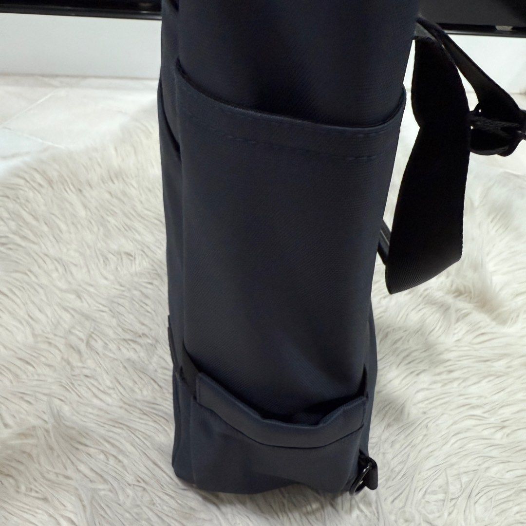 Backpack (Category: Backpacks) located in Singapore. Submitted by k00lsheep (Listing ID 1344457188, Image 5). Description: Backpack Brand NEW Not used at all Versatile backpack with dual carrying options: • The backpack sling can be neatly tucked into the back compartment. (Picture 3) • Features multiple compartments, including a dedicated laptop section. (Picture 5) • Both sides come with dual slots for added storage. Dimensions: • Length: 39cm 
