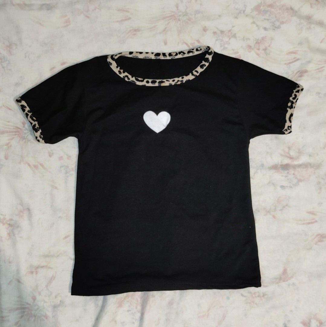 Black Cropped Top with Animal Print (Category: Shirts) located in Mandaluyong City. Submitted by aeurea (Listing ID 1344562909, Image 1). Description: Decluttering, shop my stuff! Used only a few times. Please give it a new home! 🌸 Check out my profile for more products 🌸 Please don't hesitate to msg me for more info. 🌸 All are last price unless stated otherwise. MOP: Gcash MOD: Shipping handled by buyer 🌸 Lalamove for sdd 🌸 J&T.