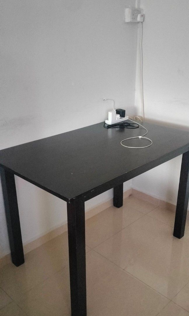 Dining Table (Category: Tables & Sets) located in Singapore. Submitted by aridasschandra (Listing ID 1344443375, Image 1). Description: Solid wood dining table Still in good condition Length - 104cm Width - 70cm Height - 74cm.