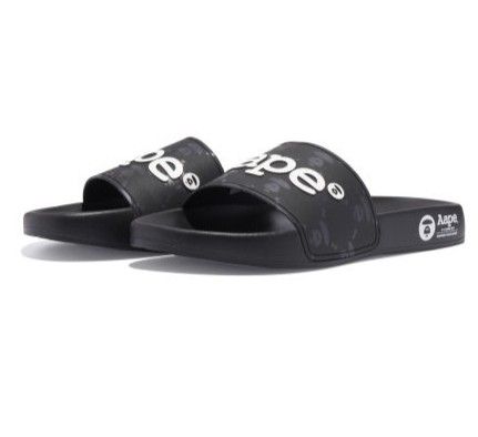 "HIP" Aape BY *A BATHING APE® Moonface Logo Sliders Black US10 AAPSHM6763XXMBKX (Category: Flipflops and Slides) located in Singapore. Submitted by nofrillsfactoryoutlet (Listing ID 1344593260, Image 2). Description: Usual : $68.80 OFFER : $55.90 LAST SET ! 100% Authentic, Brand New with Tags and packaging. Direct from Aape BY *A BATHING APE® outlet in Beijing. Brand: Aape BY *A BATHING APE® Design : Aape Moonface Logo Sliders / Slip-Ons Colour :