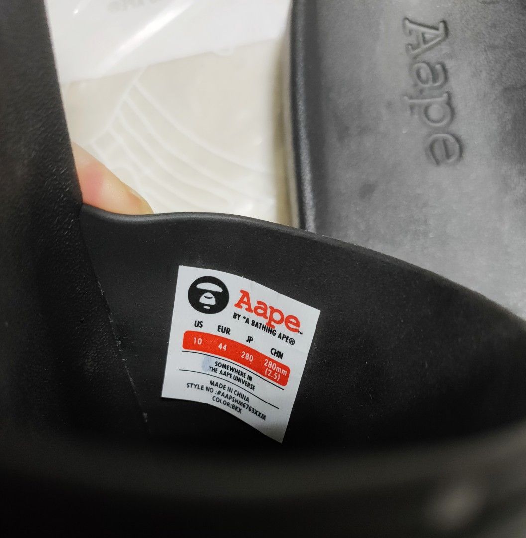 "HIP" Aape BY *A BATHING APE® Moonface Logo Sliders Black US10 AAPSHM6763XXMBKX (Category: Flipflops and Slides) located in Singapore. Submitted by nofrillsfactoryoutlet (Listing ID 1344593260, Image 7). Description: Usual : $68.80 OFFER : $55.90 LAST SET ! 100% Authentic, Brand New with Tags and packaging. Direct from Aape BY *A BATHING APE® outlet in Beijing. Brand: Aape BY *A BATHING APE® Design : Aape Moonface Logo Sliders / Slip-Ons Colour :