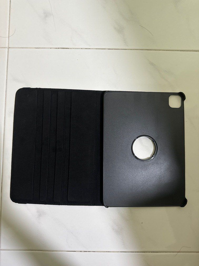 iPad Pro 11” casing (Category: Cases & Sleeves) located in Singapore. Submitted by haylky (Listing ID 1344476434, Image 3). Description: Bought it as temporary casing used it for a week before changing out. This casing can be rotate and stand up as seen in the pictures. Note that it’s not detachable. Material: Outside - leather Inside - Velvety Casing - plastic Self-collect: At Pasir Ris (Home) or Tampines East MRT Arranged delivery: Cost covered