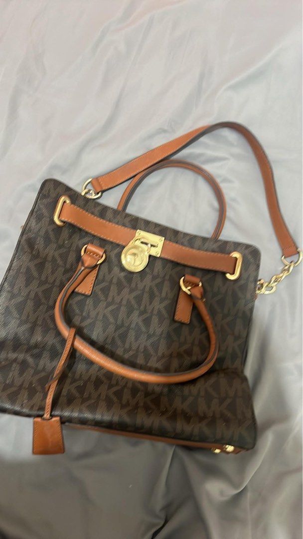 Michael Kors Hamilton Logo Large (Category: Luxury Bags & Wallets) located in Mandaluyong City. Submitted by laravictoria (Listing ID 1344480486, Image 1). Description: Original Michael Kors Halmiton Large Barely used around 3x only for office Bought from US Sold at Michael Kors website at sale price of 138USD (Php 8,000), original price at 348 USD (Php 20,000) RFS: not using anymore .