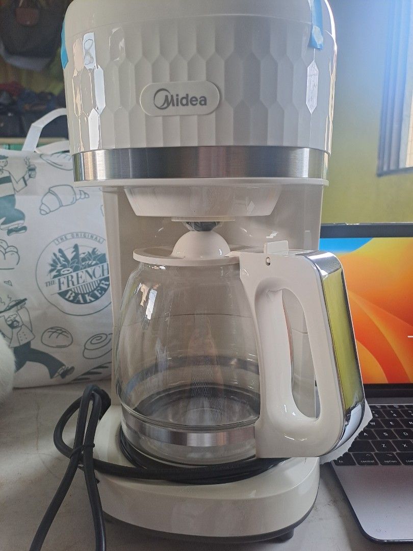 Midea Coffee Maker 12cups (Category: Coffee Machines & Makers) located in Manila. Submitted by maggie54145 (Listing ID 1344471953, Image 2). Description: Midea Coffee Maker 12 cups Brand New Binuksan lang yun box to check the item 3300pesos sa Online Shop-pe.