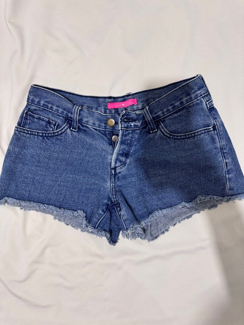 [Preloved] Low-waisted Ripped Denim Shorts (Category: Shorts) located in Bacoor. Submitted by amorousmnl (Listing ID 1344531896, Image 2). Description: Good condition; no issues Size: S-M Exact Measurements: Bottom Waist: 30" Hips: 32" Thigh: 20" Length: 10" RFS: Declutter.