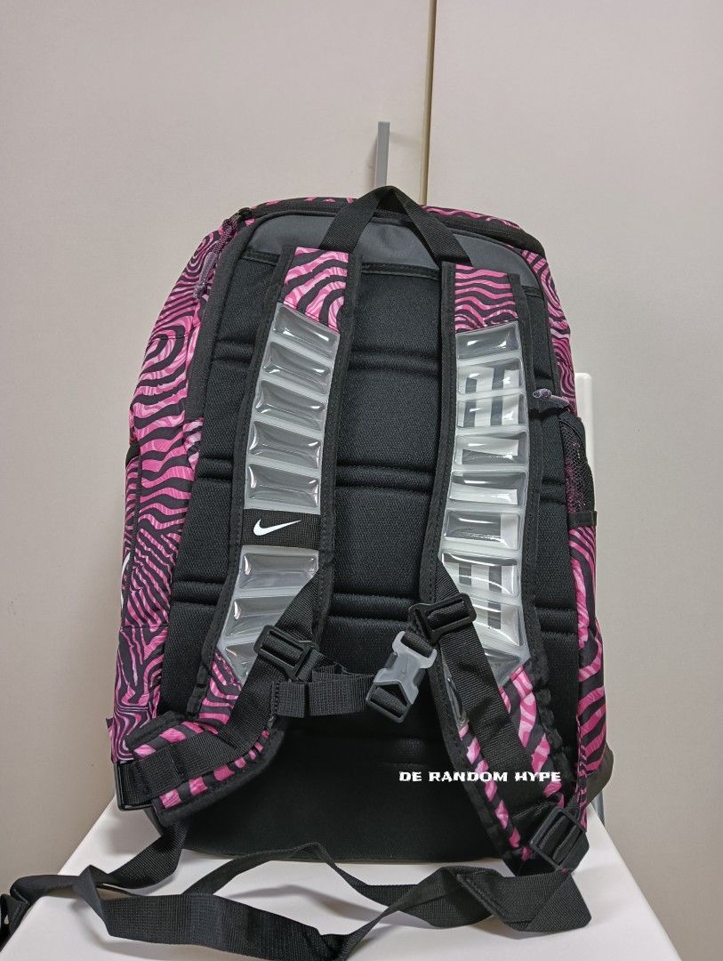 black and pink nike backpack