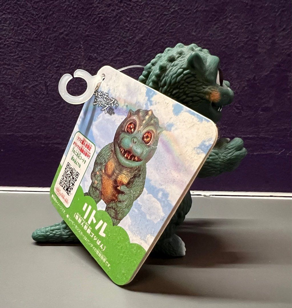 Bandai Little Godzilla (Category: Toy Figures) located in Singapore. Submitted by cards_n_collectibles (Listing ID 1344741743, Image 3). Description: Made in 2021 by Bandai, this little godzilla is from the Godziban puppet series. The figure is around 4 inches in height and has moveable arms and tail. What is Godziban? (Click on the link here to find out!) https://godzilla.fandom.com/wiki/Godziban#:~:text=Monster%20Puppet%20Show%20Godziban%20(怪獣,