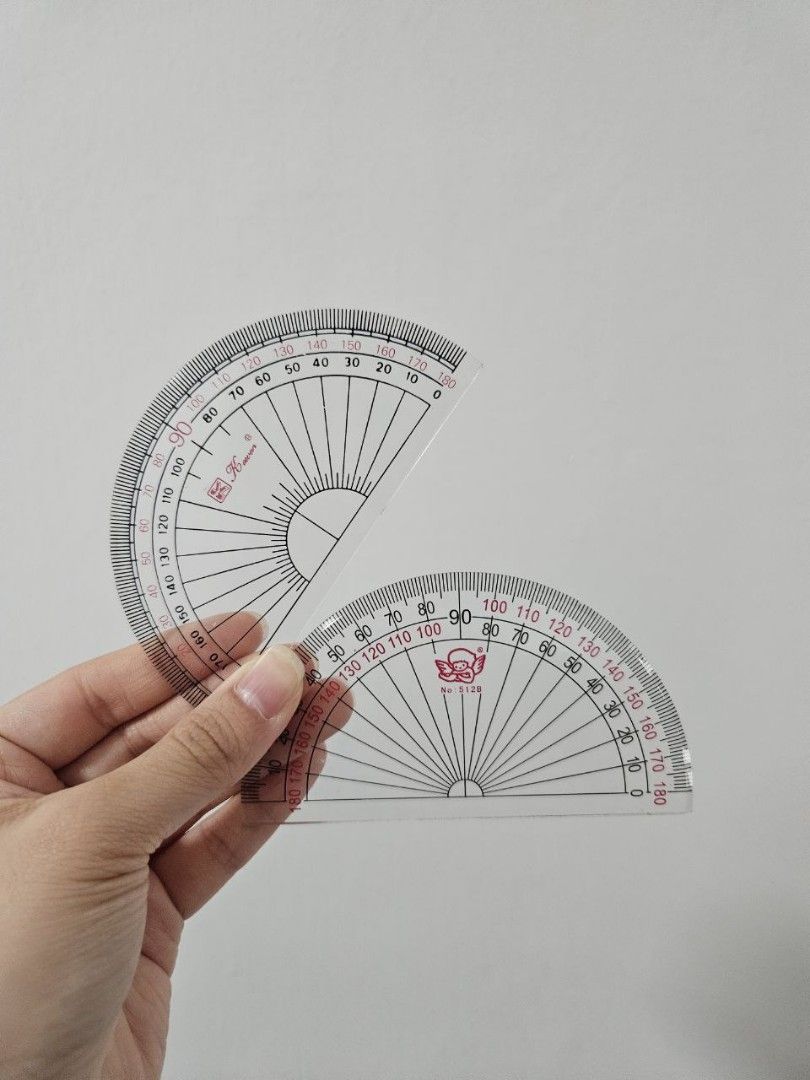 Clear Plastic Math Protractor (Category: Stationery & School Supplies) located in Singapore. Submitted by sellbom (Listing ID 1344724345, Image 2). Description: 1) 180 degrees Clear Plastic Math Protractor $2.00 each 2) Mathematical instrument set - but take note that one of the triangle (set square) already chip off. Consists of set squares, protractor and compass - $5.00 a set.