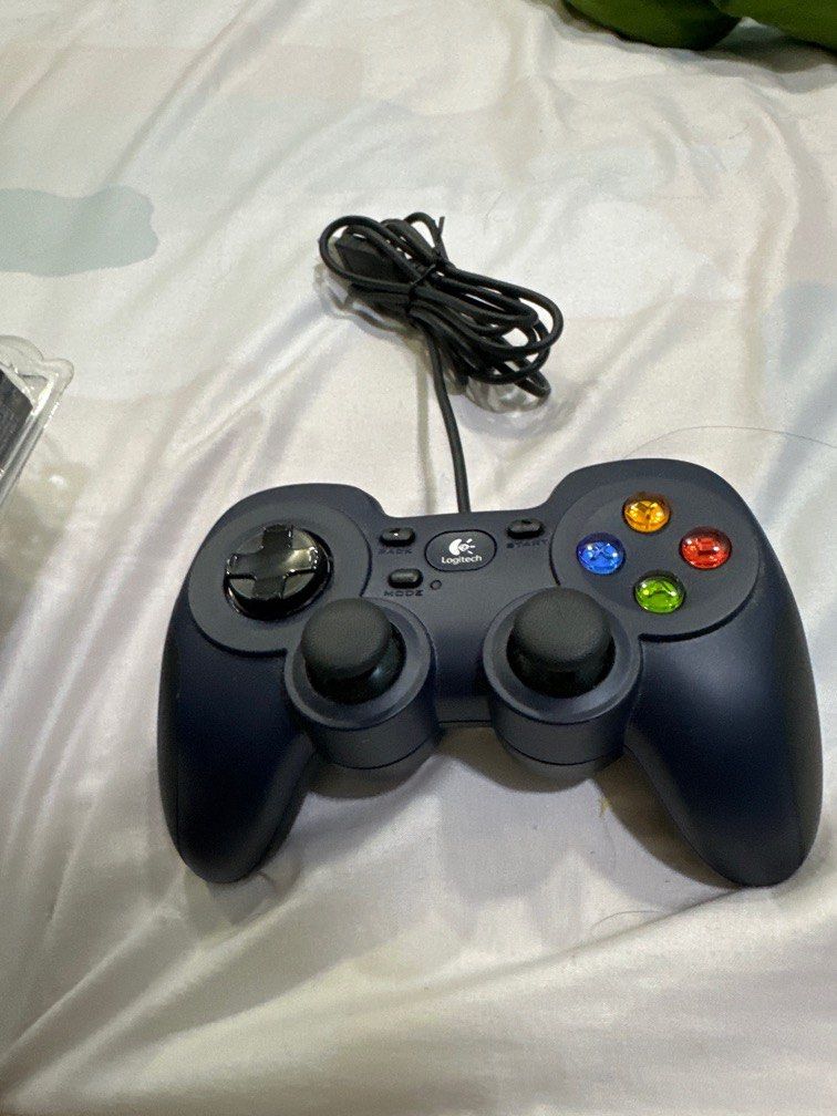 Logitech controller (wired) (Category: Controllers) located in Singapore. Submitted by smarty1 (Listing ID 1344689077, Image 2). Description: Used only 2 times, not a fan of logitech…All buttons work its as good as new Bought it at expo for 45$ Low ballers stay away Self collect @ Twin Fountains Pay by cash or paylah/paynow only .