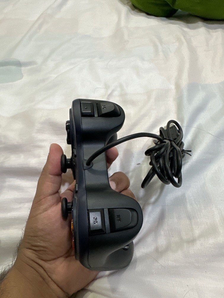 Logitech controller (wired) (Category: Controllers) located in Singapore. Submitted by smarty1 (Listing ID 1344689077, Image 3). Description: Used only 2 times, not a fan of logitech…All buttons work its as good as new Bought it at expo for 45$ Low ballers stay away Self collect @ Twin Fountains Pay by cash or paylah/paynow only .