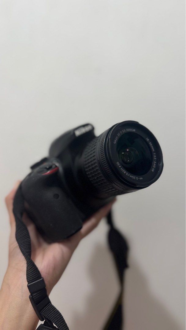 RUSH 2 Lenses + Pre-loved Nikon D3400 DSLR (Category: Cameras) located in Mandaluyong City. Submitted by ciaolongbao (Listing ID 1344690685, Image 2). Description: RUSH NIKON D3400 RARELY USED SLIGHTLY NEGOTIABLE - Can be sold without the 35mm lens, pm me your offer - With original box and papers - 18-55mm kit lens - 35mm 1.8g prime lens (worth 7k) - original charger - original battery - original nikon bag (flawed, need itahi) - PM FOR SAMPLE SHO