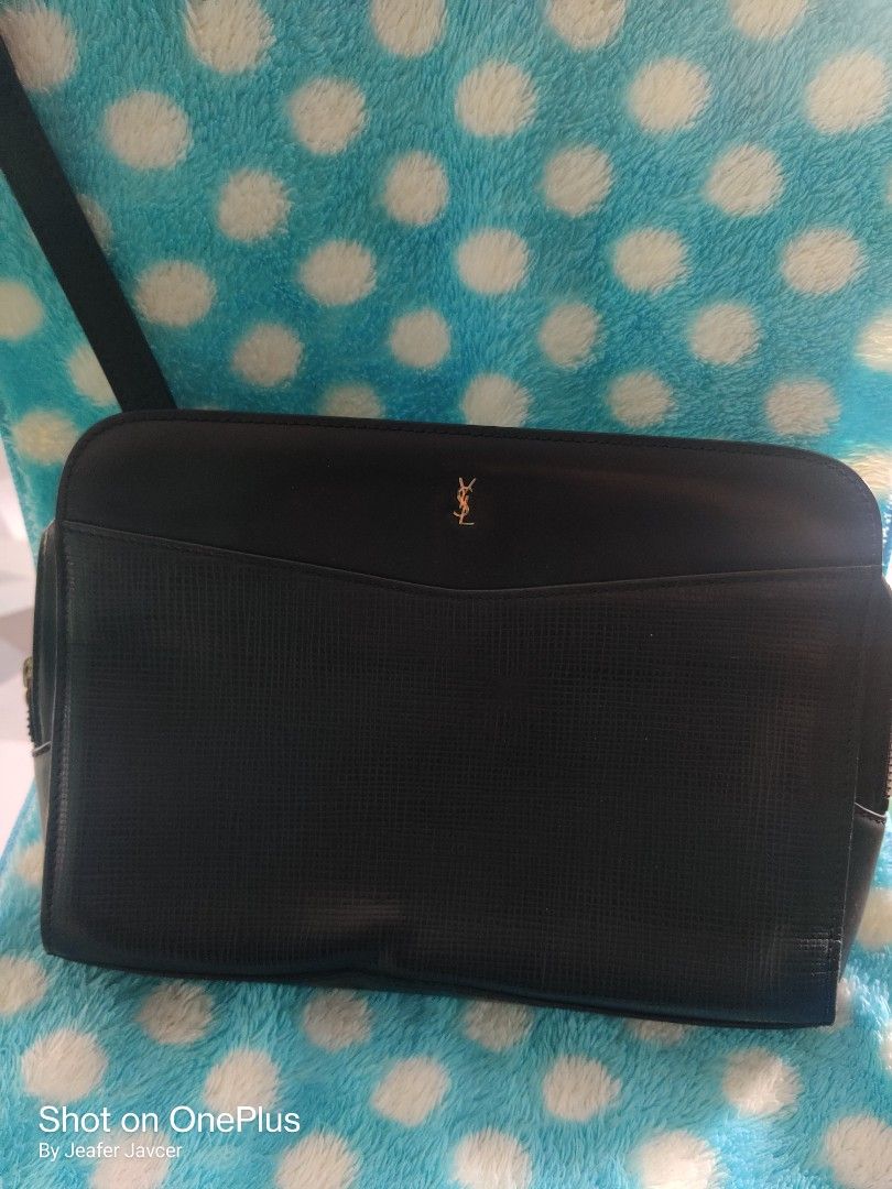 YSL clutch bag (Category: Luxury Bags & Wallets) located in Baguio. Submitted by ferns_garage.0924 (Listing ID 1344669921, Image 1). Description: vintage type YSL clutch bag with tag 3 compartments zipper tested working sign of usage, barely noticeable flaw scan pics for reference and other details wysiwyg, buy as it is MOP GCASH location Baguio the seller is not liable for any damage or loss of the item due to mishandling of the courier..