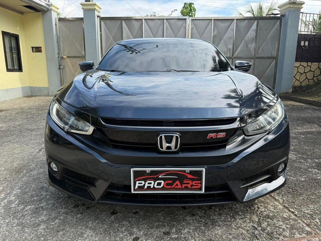Honda Civic RS Turbo Auto (Category: Used Cars) located in Manila. Submitted by quality_cars (Listing ID 1339772932, Image 2). Description: ‼️ FOR SALE ‼️ 💥Honda Civic (RS TURBO) 💥 ➡️ 2018 Model OR/CR ➡️ TOP OF THE LINE ➡️ 1.5 DOHC Vtec RS Turbo ➡️ Cosmic Blue ➡️ Matic trans ➡️ Paddle shift ➡️ Push start ( keyless entry ) ➡️ All power ➡️ Power seats ➡️ Full digital panel gauge ➡️ Touchscreen headunit with climate control ➡️ Back camera ➡️ Head 