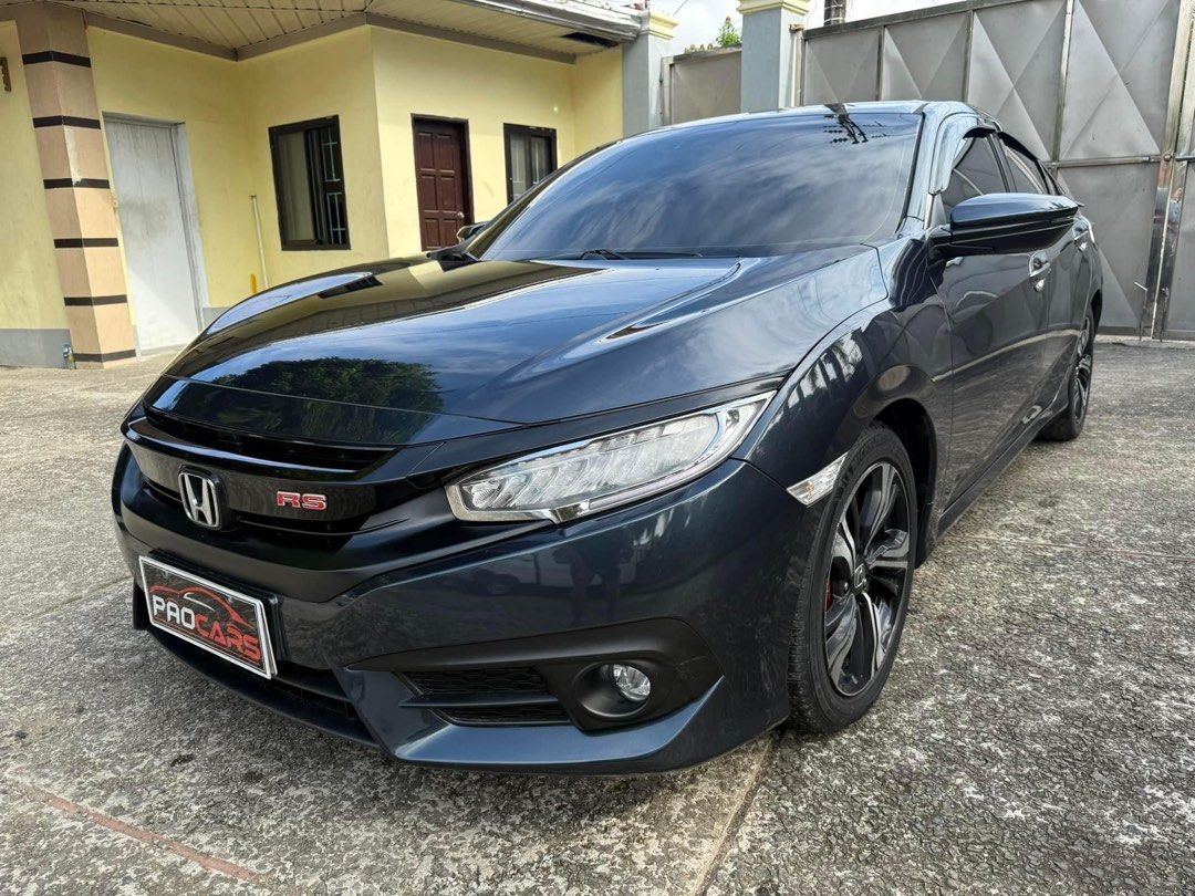 Honda Civic RS Turbo Auto (Category: Used Cars) located in Manila. Submitted by quality_cars (Listing ID 1339772932, Image 3). Description: ‼️ FOR SALE ‼️ 💥Honda Civic (RS TURBO) 💥 ➡️ 2018 Model OR/CR ➡️ TOP OF THE LINE ➡️ 1.5 DOHC Vtec RS Turbo ➡️ Cosmic Blue ➡️ Matic trans ➡️ Paddle shift ➡️ Push start ( keyless entry ) ➡️ All power ➡️ Power seats ➡️ Full digital panel gauge ➡️ Touchscreen headunit with climate control ➡️ Back camera ➡️ Head 