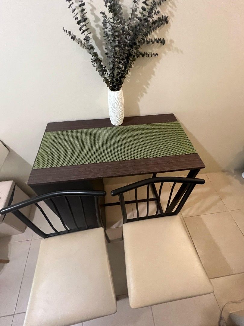 Mandaue Dining Table Set with Shelves and High Chairs (Category: Tables & Sets) located in Quezon City. Submitted by braveheartleo (Listing ID 1339766280, Image 3). Description: 📣📣📣*FOR SALE* 📣📣📣 Letting go this preloved Mandaue brand set dining table with 3 tier shelves & 2-high chairs RFS: Prefers now much portable/smaller furnitures (limited space in a studio room size) Original Price Php10,000++ Selling Price: Php6,000 Condition: Very d