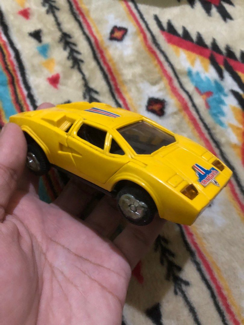 Old toy cars (Category: Vehicle & Diecast Models) located in Quezon City. Submitted by markgolveo (Listing ID 1339771957, Image 3). Description: Old toy cars Yellow car with power and lights Bad wheel gears wont push the car Defective motor .