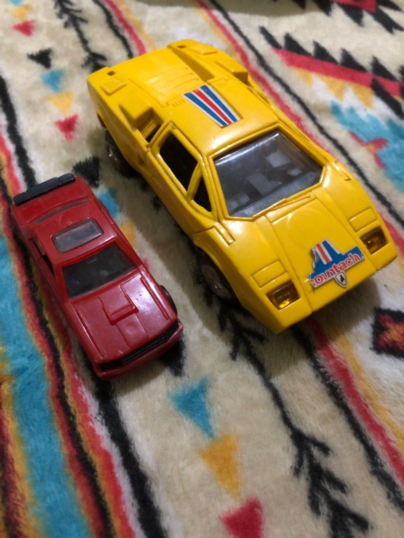 Old toy cars (Category: Vehicle & Diecast Models) located in Quezon City. Submitted by markgolveo (Listing ID 1339771957, Image 1). Description: Old toy cars Yellow car with power and lights Bad wheel gears wont push the car Defective motor .