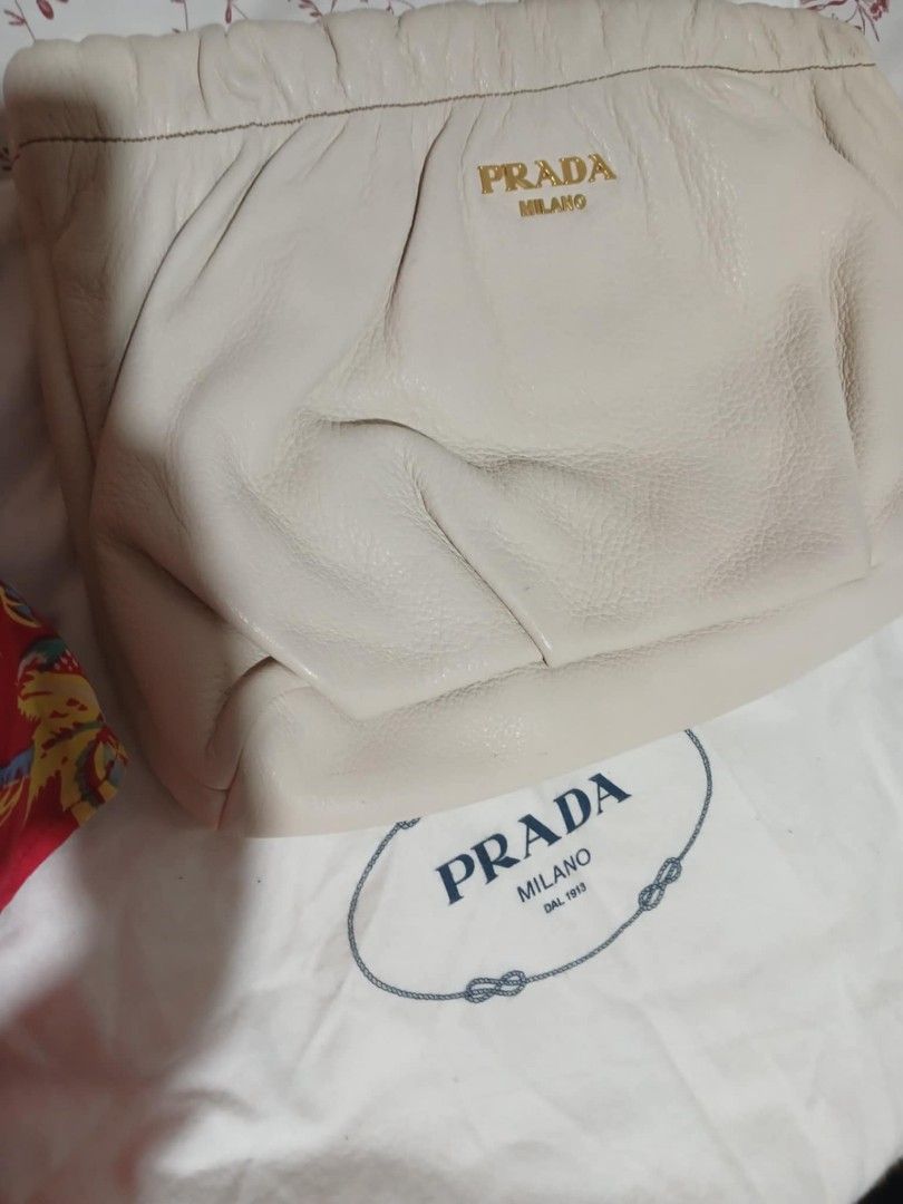 Prada Clutch (Category: Luxury Bags & Wallets) located in Marikina City. Submitted by laila15 (Listing ID 1339924380, Image 3). Description: Prada Pouch Excellent Condition Available inclusion : Dust bag & Authenticity card.