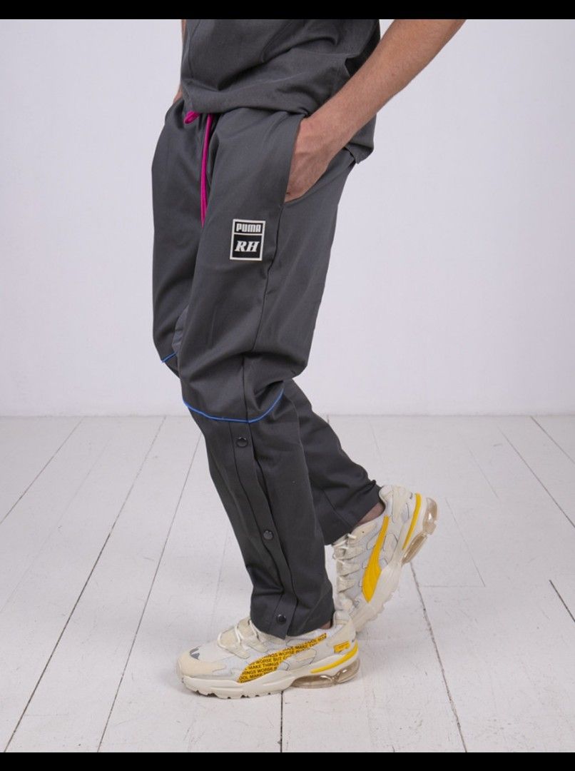 Puma x Rhude Woven Snap Track Pants Men s Fashion Bottoms Joggers on Carousell
