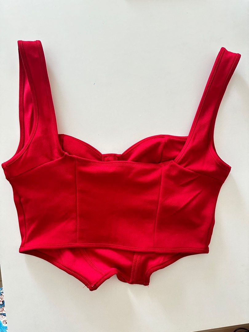Red Sleeveless Top Corset with boning (Category: Sleeveless) located in Bayombong. Submitted by chie_3030 (Listing ID 1339767765, Image 3). Description: Used during the Halloween for Little Red Riding Hood costume. See photos at the end. The black skirt and the cape are also on sale! Black skirt - 170 Red hood/cape - 130.