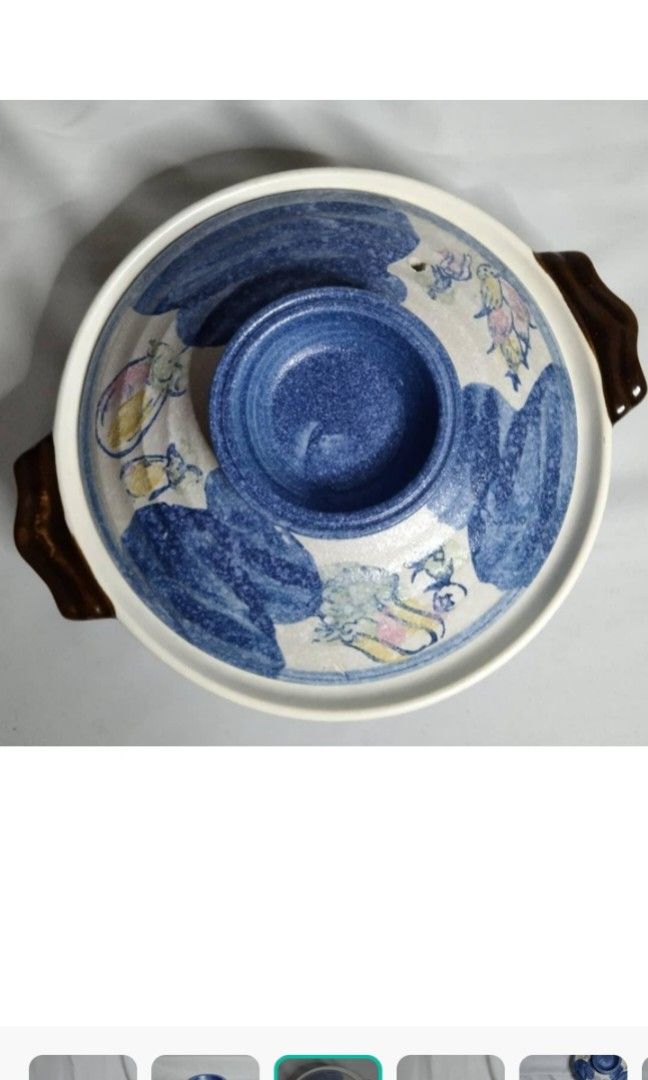 Donabe Claypot cookware (Category: Cookware & Accessories) located in Las Pinas. Submitted by drummerjazz (Listing ID 1340037204, Image 1). Description: Blue cover Donabe Claypot Clean body and bottom Dimensions: Height: 3" Diameter: 10“ (without handle) You need to season this claypot before first use..