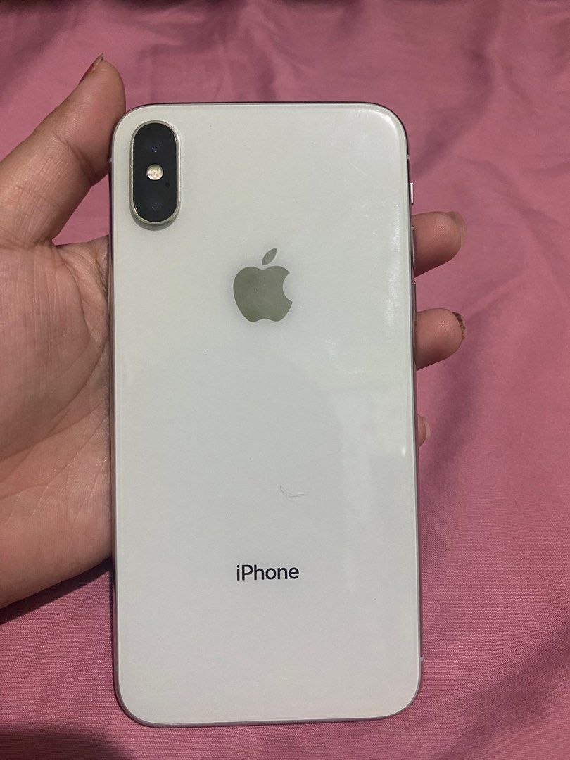 Iphone X 256GB (Category: iPhone X Series) located in Manila. Submitted by studentista (Listing ID 1340032902, Image 1). Description: Iphone X 256GB LAST PRICE! NO LOWBALLERS PLS ✅ Face ID ✅ Apple ID ✅ No sim Restriction ✅ 98% Battery Health (pero madali na malowbatt) last time I checked. ✅ Unit only ■ HONEST ISSUE: ✅️Bought this last January 2023 for almost 14k pa (used as spare phone so di masyado nagagamit, issue na rin battery before pero di 