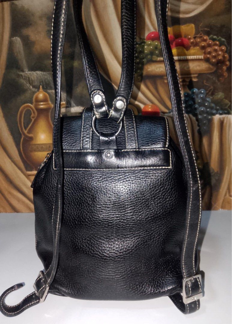 MCM backpack (Category: Luxury Bags & Wallets) located in Muntinlupa City. Submitted by phbudgetluxuryfinds (Listing ID 1340077454, Image 3). Description: Authentic pebbled leather Cute size Good condition (One screw cap missing at the back; unnoticeable).