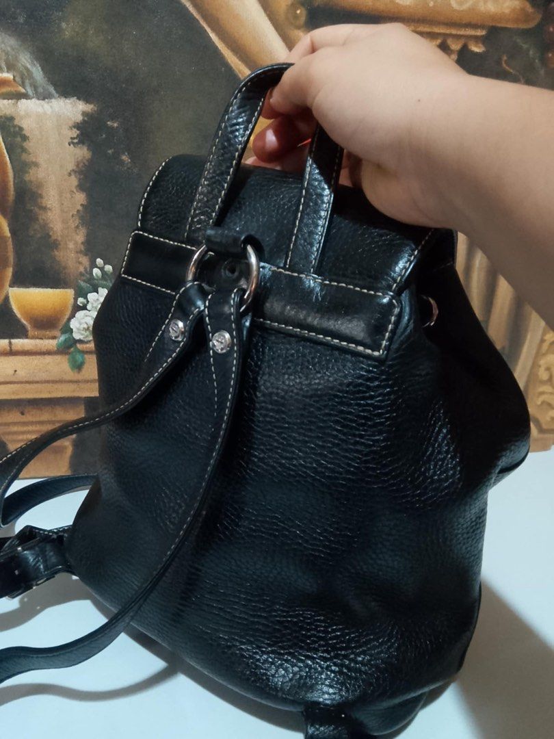 MCM backpack (Category: Luxury Bags & Wallets) located in Muntinlupa City. Submitted by phbudgetluxuryfinds (Listing ID 1340077454, Image 2). Description: Authentic pebbled leather Cute size Good condition (One screw cap missing at the back; unnoticeable).