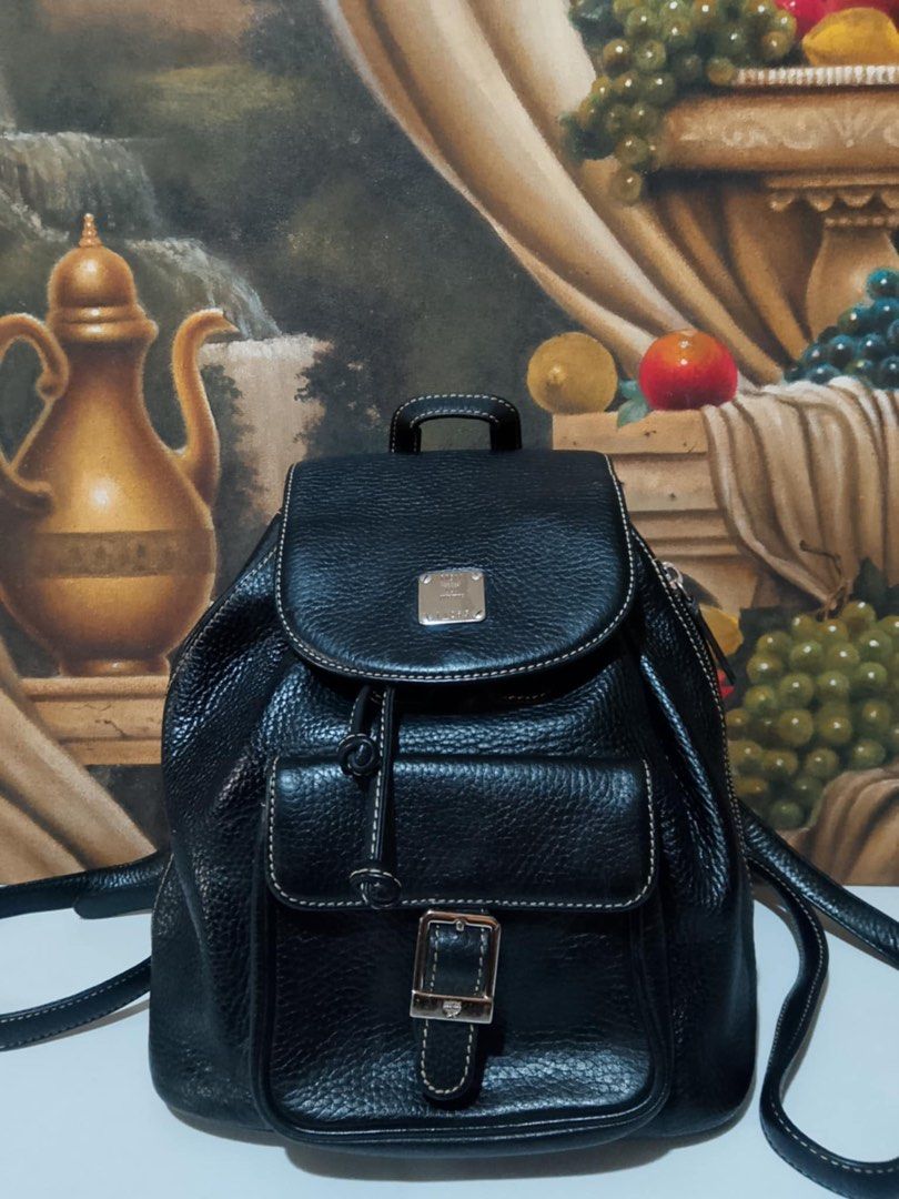 MCM backpack (Category: Luxury Bags & Wallets) located in Muntinlupa City. Submitted by phbudgetluxuryfinds (Listing ID 1340077454, Image 1). Description: Authentic pebbled leather Cute size Good condition (One screw cap missing at the back; unnoticeable).