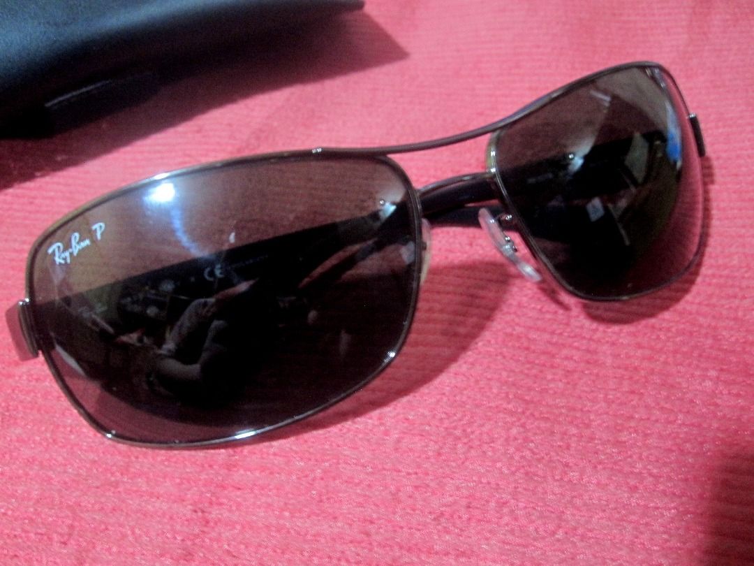 Ray-Ban RB 3379 Polarized Rectangular Sunglasses (Category: Sunglasses & Eyewear) located in Mandaue City. Submitted by oddball84 (Listing ID 1340023407, Image 1). Description: Original Ray-Ban RB3379 UV polarized sunglasses. Bought in Florida USA made in Italy. Product details from website: The shades for people who get things done, and look good doing it. Ray-Ban® RB3379 Polarized Sunglasses are built in the classic navigator style, with softly