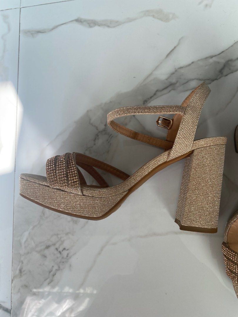 Rose Gold high-heeled Sandals (Category: Flats & Sandals) located in Quezon City. Submitted by ginggaloo (Listing ID 1339931075, Image 3). Description: Used 1x. Good for formal events Original price 1K + Size is US 6.5.