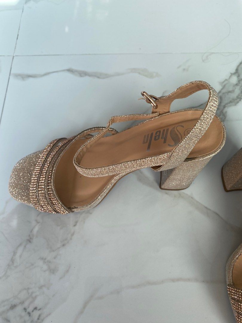 Rose Gold high-heeled Sandals (Category: Flats & Sandals) located in Quezon City. Submitted by ginggaloo (Listing ID 1339931075, Image 2). Description: Used 1x. Good for formal events Original price 1K + Size is US 6.5.