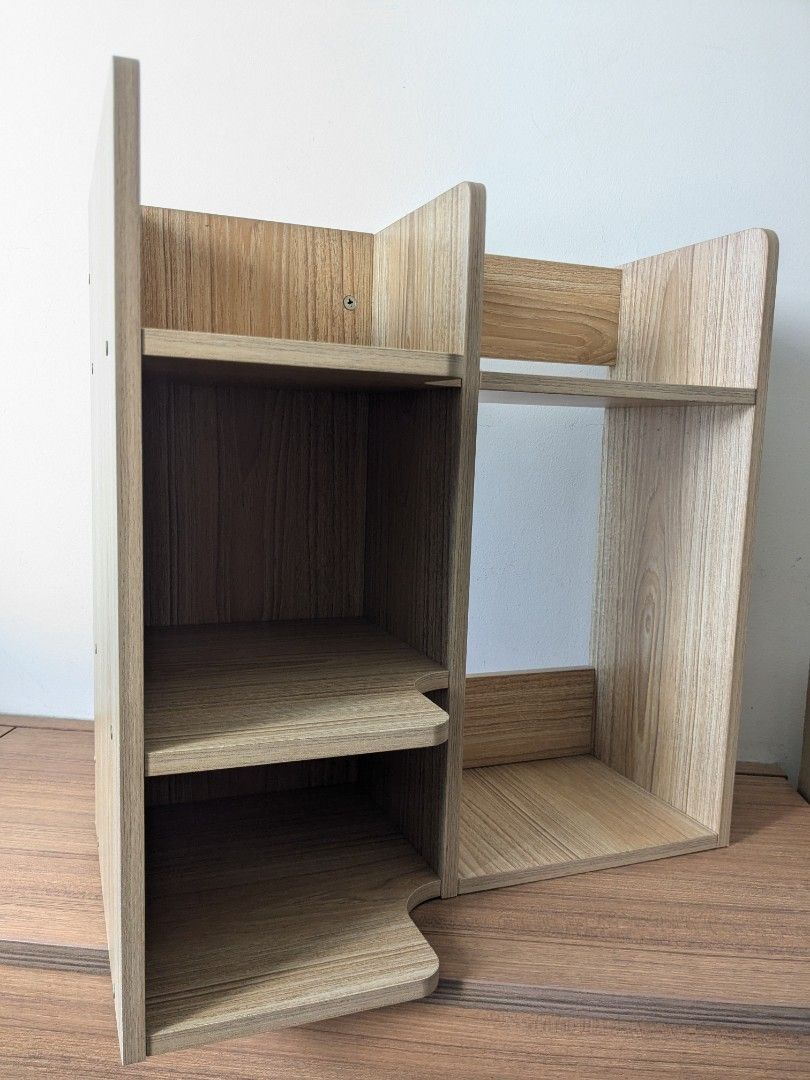 Solid Shelf (Category: Shelves, Cabinets & Racks) located in Singapore. Submitted by velvethunder (Listing ID 1340004253, Image 1). Description: No scratches, discoloration Heavy 7-8kg 50cm height 50cm length Left side 3 compartments: 15cm bottom, 20cm middle, open top Right side: 35cm w open back, top open.