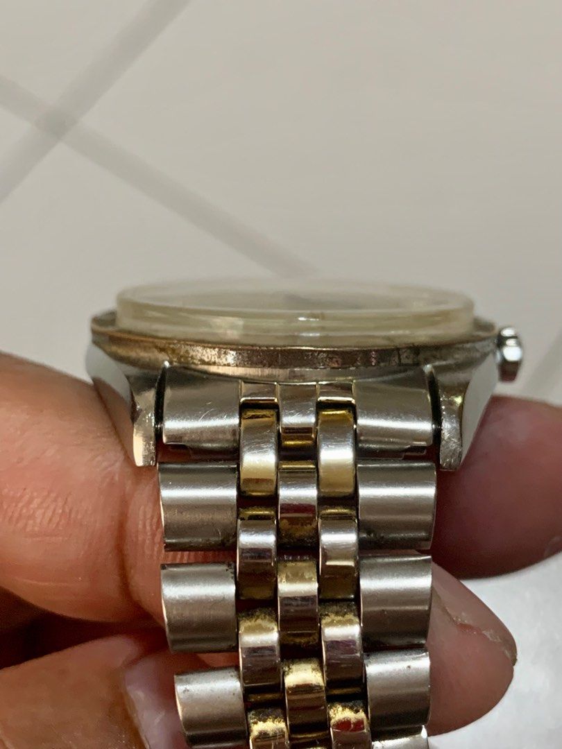 Titus Titomatic Royal Time (Category: Men's Watches) located in Cebu City. Submitted by boyrey (Listing ID 1340054049, Image 3). Description: Vintage Titus Titomatic Swiss made 36mm case size including crown 19mm lug width Unpolished, original case/crystal/crown Champagne dial w/ applied logo, star and markers Automatic and hand-winding Original patina on dial Aftermarket bracelet In good working condition Keeps good time Item in Cebu City.