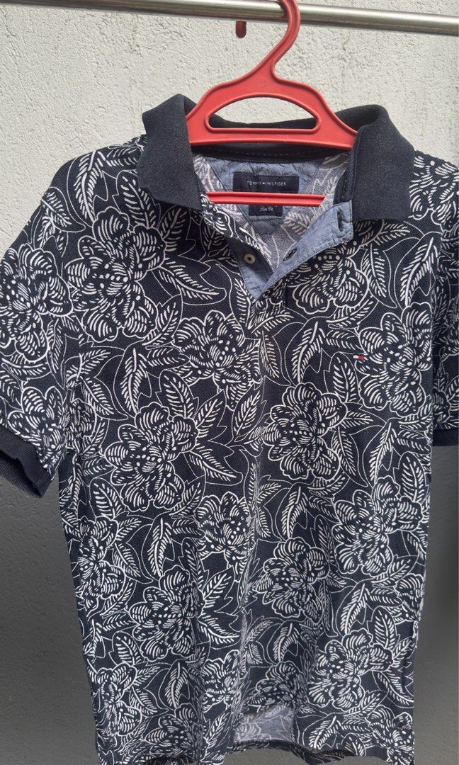 Tommy Hilfiger Polo Shirt (Category: Tshirts & Polo Shirts ) located in Navotas City. Submitted by papi404 (Listing ID 1340003110, Image 1). Description: 19.5x28.5 Issue: May stain but can be removed through washing Color rate: 9/10.