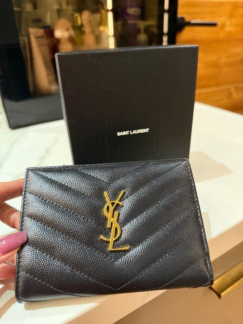 YSL wallet (Category: Luxury Bags & Wallets) located in Quezon City. Submitted by zerinap (Listing ID 1340059249, Image 1). Description: Authentic Complete Inclusions.