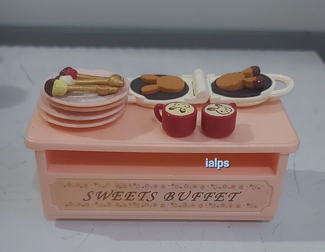 2009 Sylvanian Families Sweets Buffet Playset (Category: Kids Toys) located in Angono. Submitted by lpsflover (Listing ID 1340119273, Image 2). Description: Price is firm. Super rare. Almost complete, missing a golden fork which is replaced by a silver one. Added a cupcake tier display with pastries as freebies. In good condition but please manage your expectations on more than a decade old item. May have minimal scratches due to long storage, ne