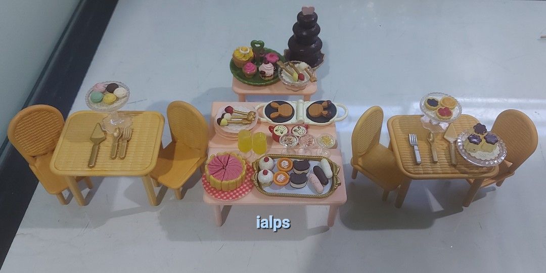 2009 Sylvanian Families Sweets Buffet Playset (Category: Kids Toys) located in Angono. Submitted by lpsflover (Listing ID 1340119273, Image 1). Description: Price is firm. Super rare. Almost complete, missing a golden fork which is replaced by a silver one. Added a cupcake tier display with pastries as freebies. In good condition but please manage your expectations on more than a decade old item. May have minimal scratches due to long storage, ne