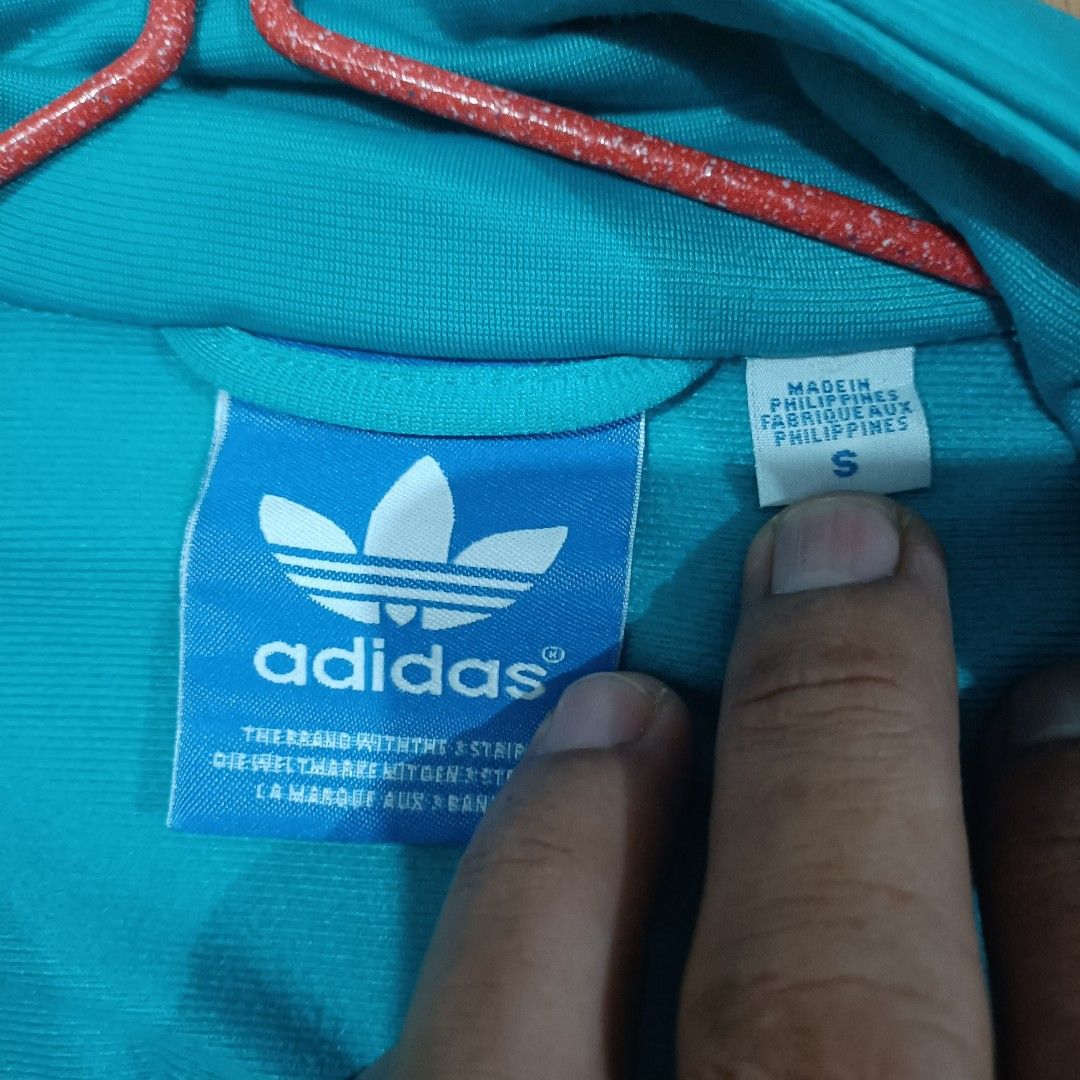 Adi Track Jacket trefoil (Category: Coats, Jackets and Outerwear) located in General Santos City (Dadiangas). Submitted by Serde (Listing ID 1340232305, Image 2). Description: Adi TJ 3foil 21x26.5 Rare Aqua Blue excellent no issue.