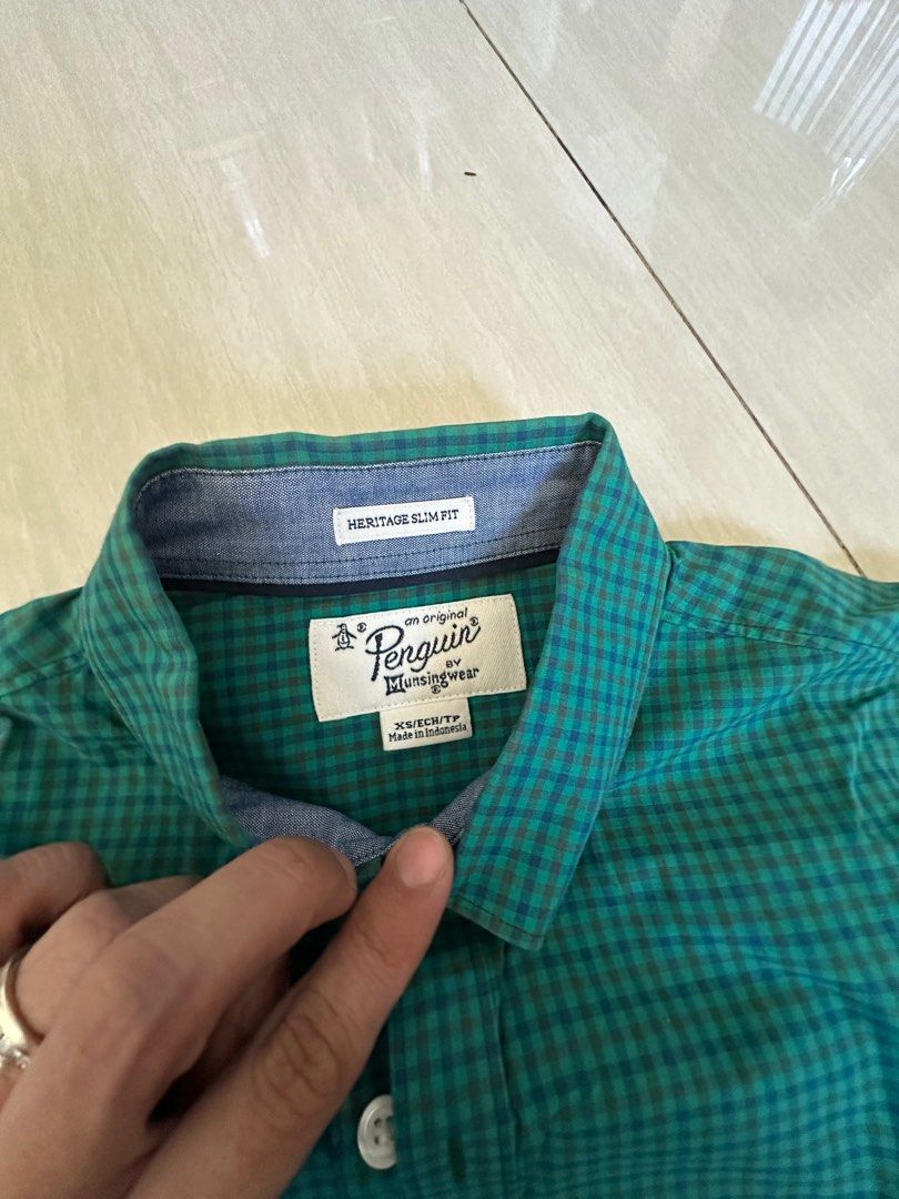 Authentic Penguin Button Down Long Sleeves (Category: Formal Shirts) located in Pasig City. Submitted by mrdecluttering_ph (Listing ID 1340118375, Image 2). Description: Authentic Penguin Long Sleeves Checkered Green XS Bought in Penguin Store Rfs decluttering Negotiable Shipping fee c/o buyer.