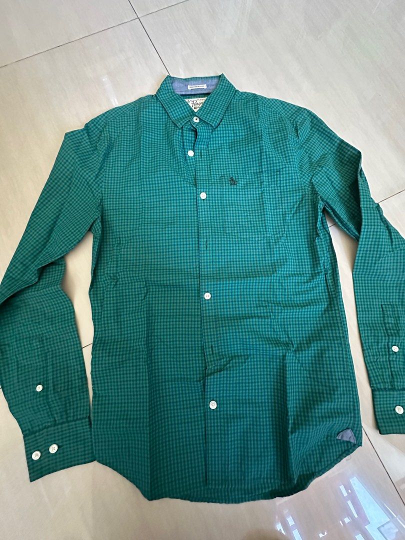Authentic Penguin Button Down Long Sleeves (Category: Formal Shirts) located in Pasig City. Submitted by mrdecluttering_ph (Listing ID 1340118375, Image 1). Description: Authentic Penguin Long Sleeves Checkered Green XS Bought in Penguin Store Rfs decluttering Negotiable Shipping fee c/o buyer.
