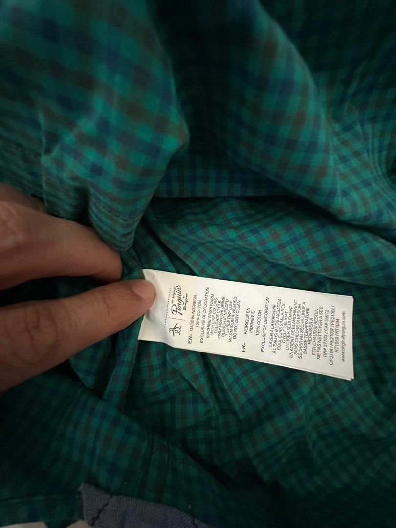 Authentic Penguin Button Down Long Sleeves (Category: Formal Shirts) located in Pasig City. Submitted by mrdecluttering_ph (Listing ID 1340118375, Image 3). Description: Authentic Penguin Long Sleeves Checkered Green XS Bought in Penguin Store Rfs decluttering Negotiable Shipping fee c/o buyer.