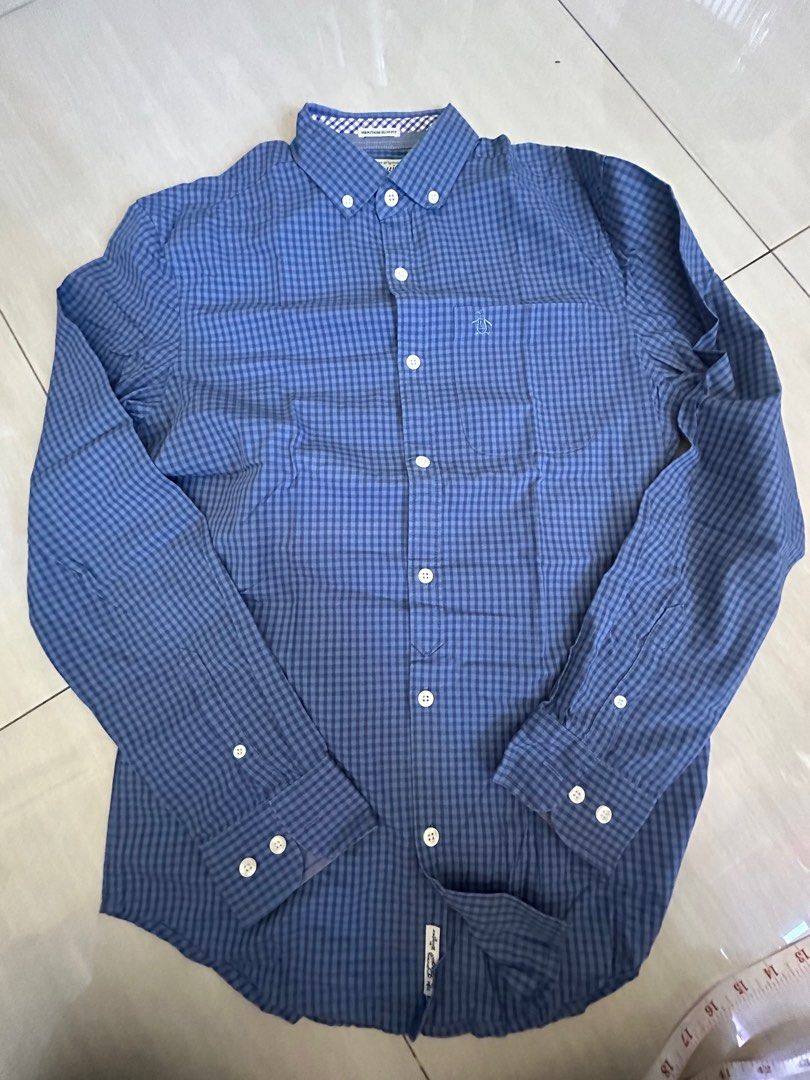 Authentic Penguin Button Long Sleeves (Category: Formal Shirts) located in Pasig City. Submitted by mrdecluttering_ph (Listing ID 1340122032, Image 1). Description: Authentic Penguin Long Sleeves Checkered Blue XS Bought in Penguin Store Rfs decluttering Negotiable Shipping fee c/o buyer.