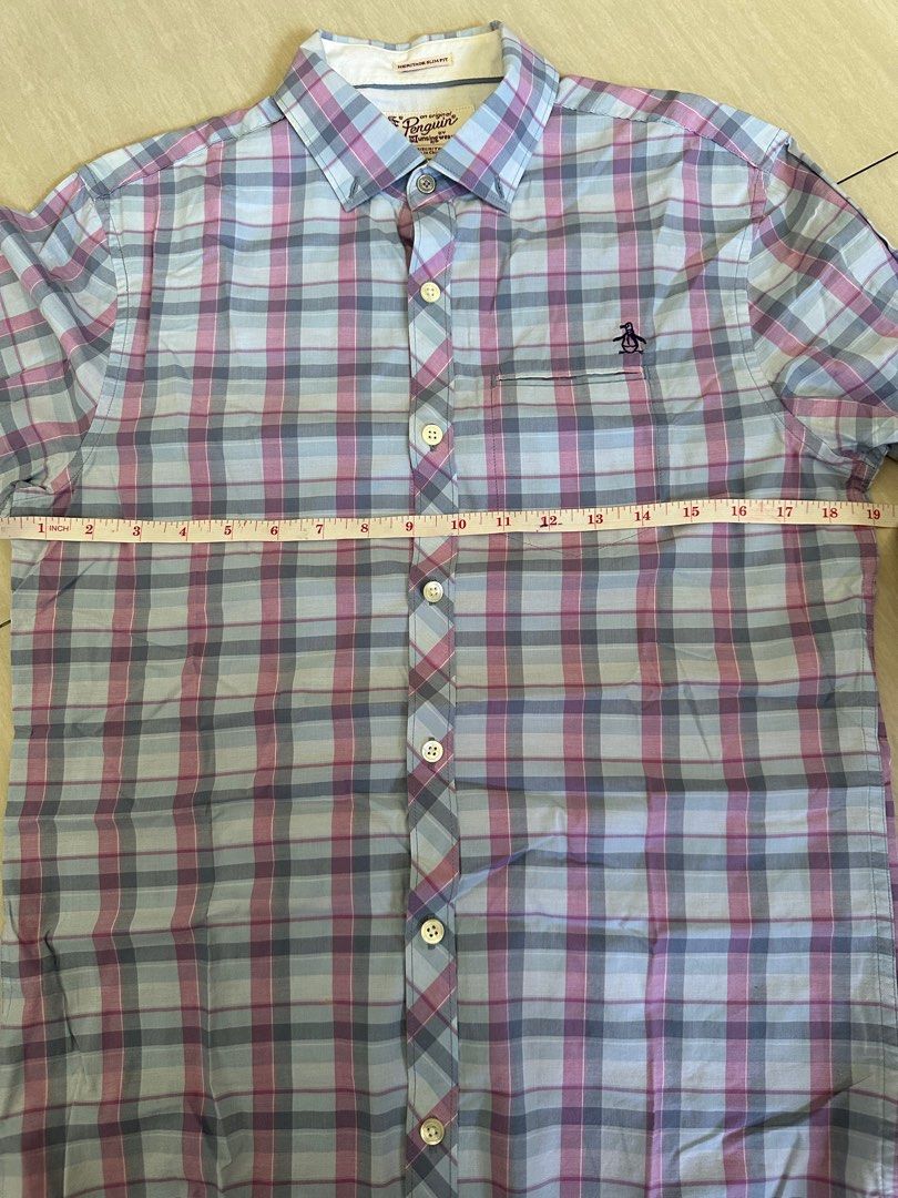 Authentic Penguin Button Down Long Sleeves (Category: Formal Shirts) located in Pasig City. Submitted by mrdecluttering_ph (Listing ID 1340122783, Image 2). Description: Authentic Penguin Long Sleeves Checkered light blue and pink XS Bought in Penguin Store Rfs decluttering Negotiable Shipping fee c/o buyer.