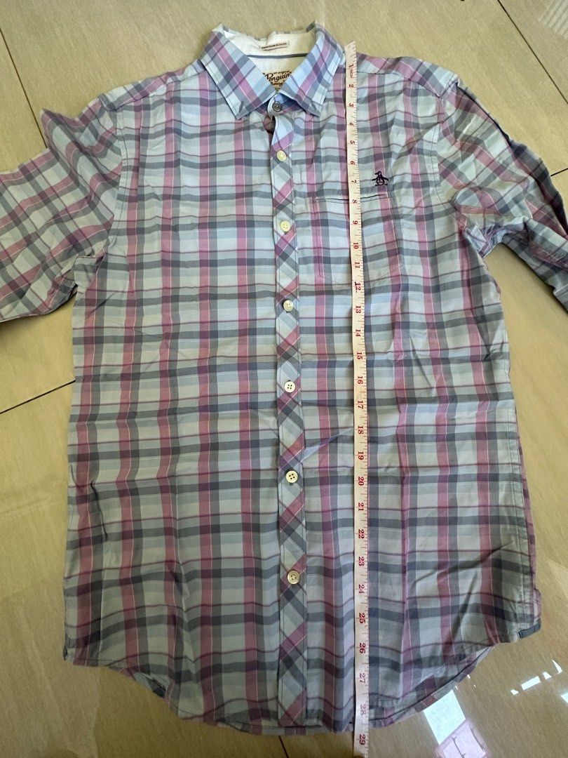 Authentic Penguin Button Down Long Sleeves (Category: Formal Shirts) located in Pasig City. Submitted by mrdecluttering_ph (Listing ID 1340122783, Image 3). Description: Authentic Penguin Long Sleeves Checkered light blue and pink XS Bought in Penguin Store Rfs decluttering Negotiable Shipping fee c/o buyer.