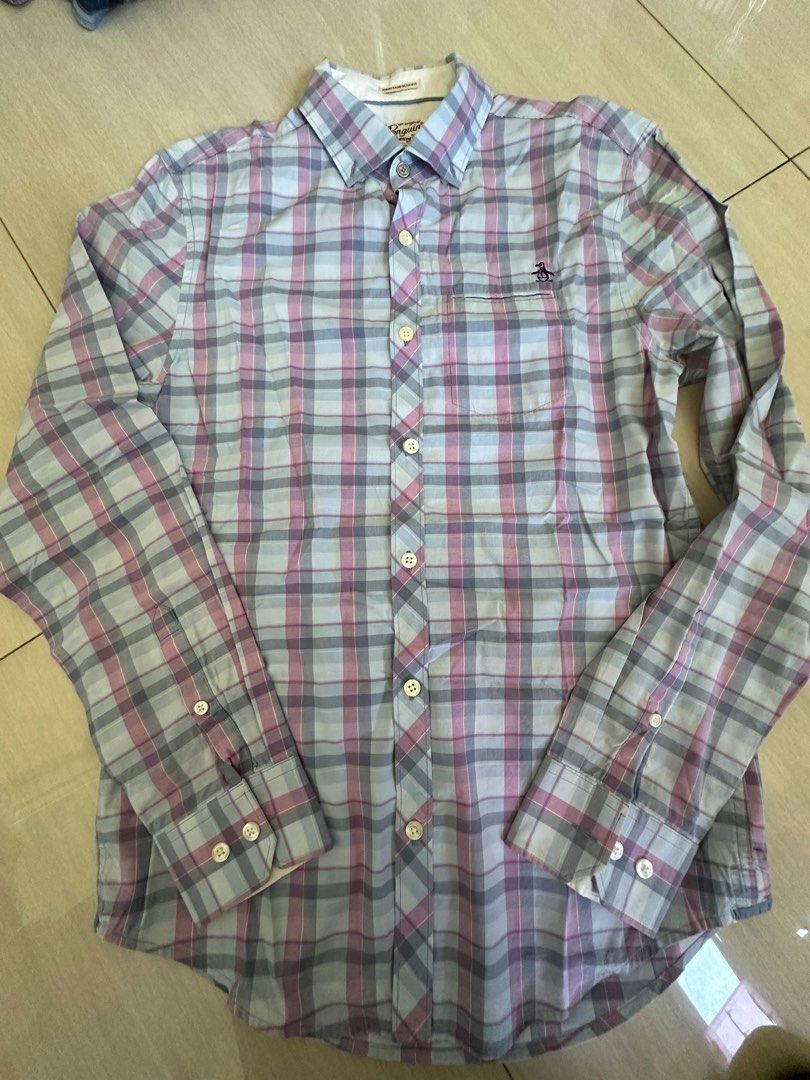 Authentic Penguin Button Down Long Sleeves (Category: Formal Shirts) located in Pasig City. Submitted by mrdecluttering_ph (Listing ID 1340122783, Image 1). Description: Authentic Penguin Long Sleeves Checkered light blue and pink XS Bought in Penguin Store Rfs decluttering Negotiable Shipping fee c/o buyer.