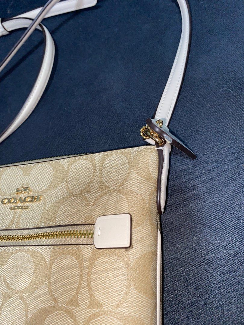 Coach Mini Rowan File Bag Color: Light Khaki Chalk (Category: Luxury Bags & Wallets) located in Pasay City. Submitted by par09 (Listing ID 1340129752, Image 2). Description: May mga Konting defect SRP 16,300.00 .