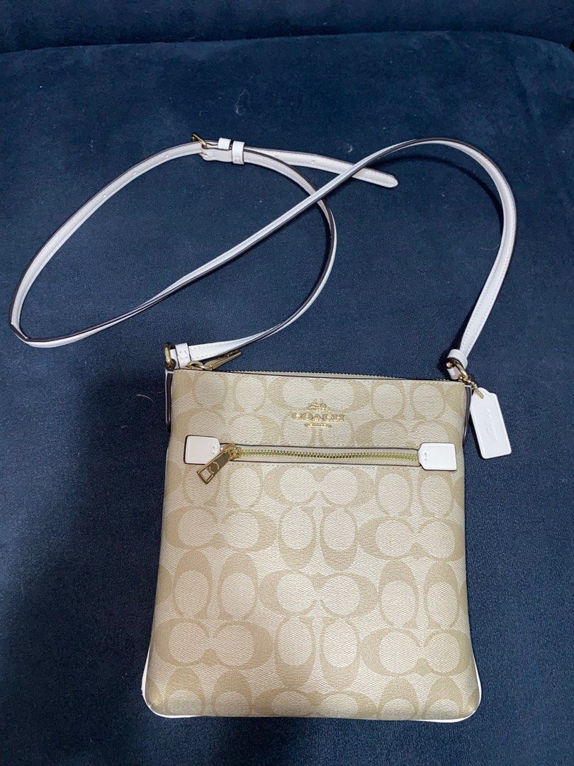 Coach Mini Rowan File Bag Color: Light Khaki Chalk (Category: Luxury Bags & Wallets) located in Pasay City. Submitted by par09 (Listing ID 1340129752, Image 1). Description: May mga Konting defect SRP 16,300.00 .